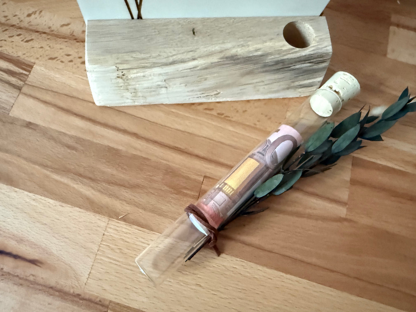 Money gift small wish fulfiller in a test tube