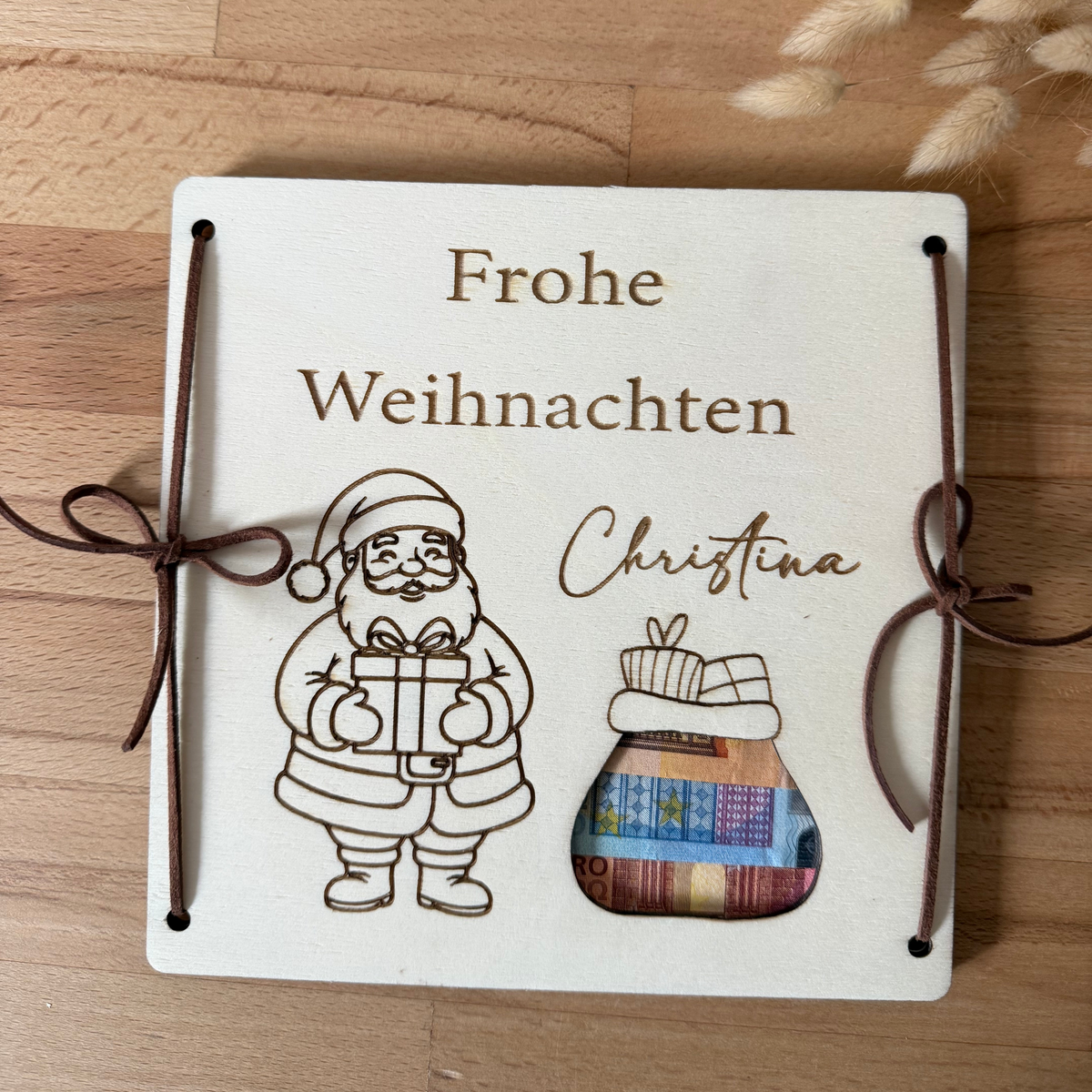 Personalisiertes Geldgeschenk zu Weihnachten mit Wunschname und Weihnachtsmann-Motiv