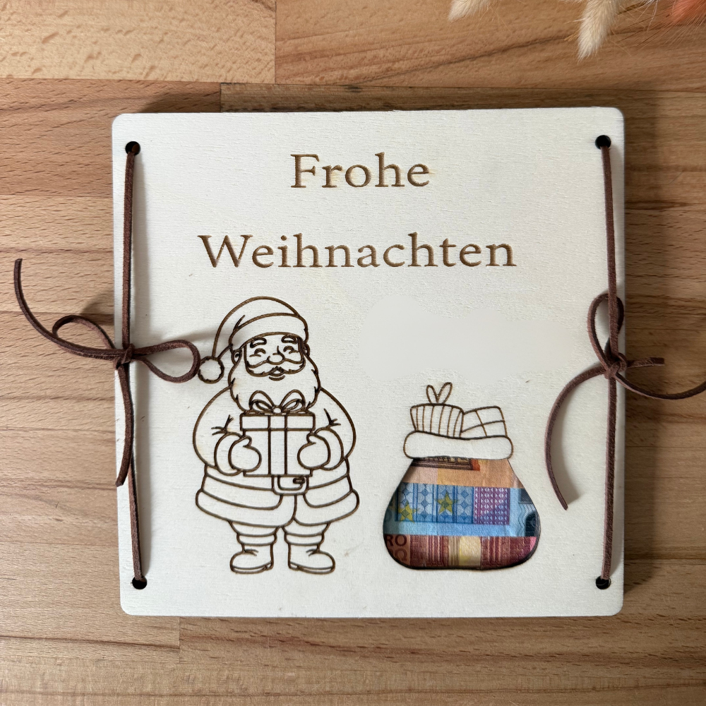 Personalisiertes Geldgeschenk zu Weihnachten aus Holz mit Weihnachtsmann, Wunschname und Geldschein im Geldsack